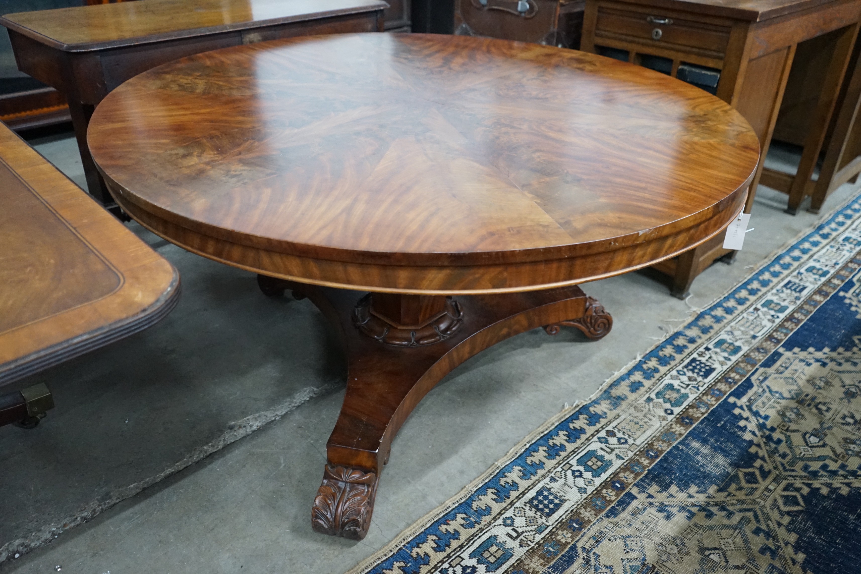 A William IV mahogany circular tilt top breakfast table, diameter 129cm, height 71cm
